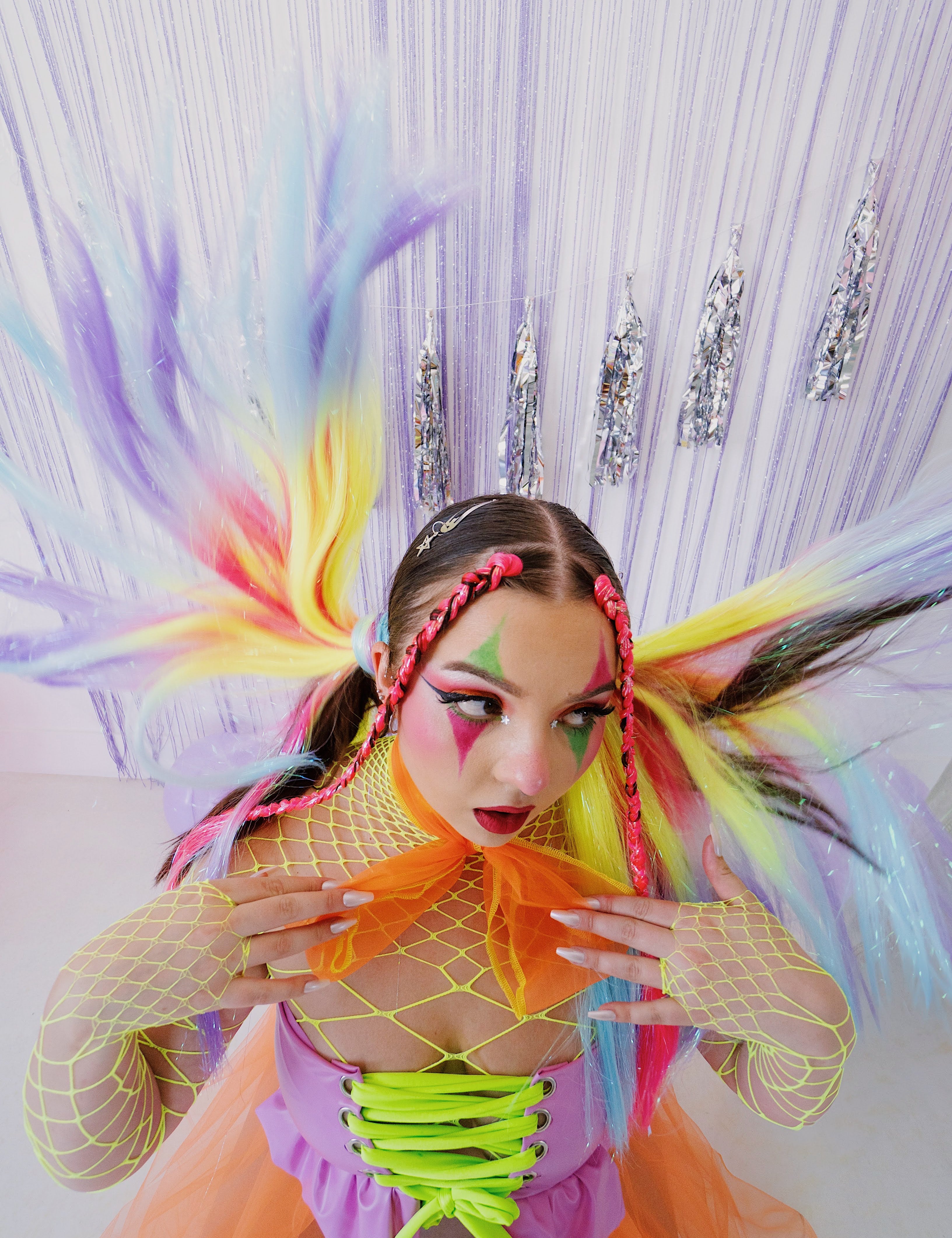 Colorful rave outfit with eye makeup
