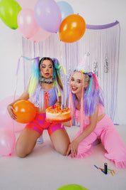 2 women at rave theme birthday party